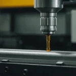 Close-up of an injection molding machine with a focus on the nozzle