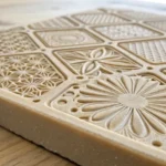 Close-up of an injection molded plastic surface with diverse textures