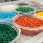 Close-up view of colorful plastic pellets on a workbench