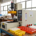Compact desktop injection molding machine in a workshop