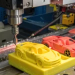Close-up of a high-tech injection molding machine producing toy cars