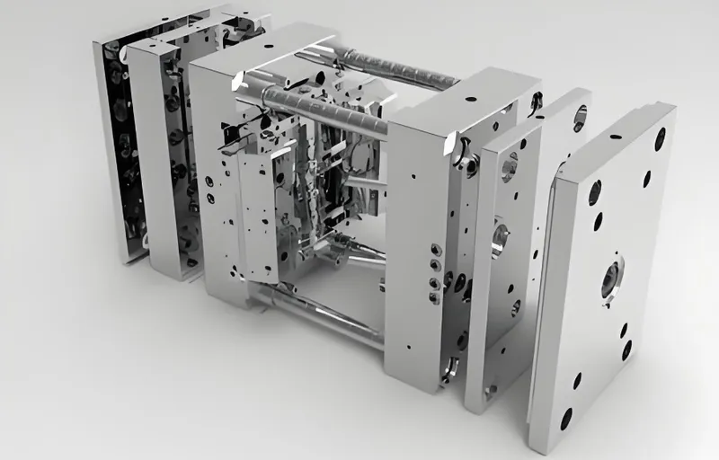 A set of disassembled industrial metal molds with multiple components displayed