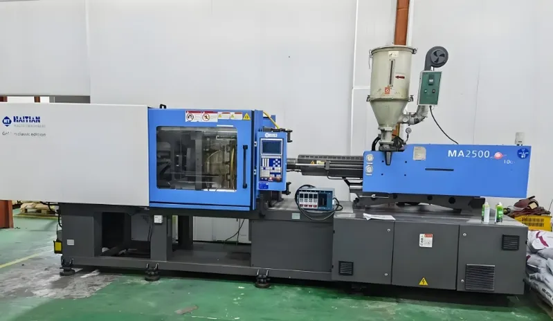 Haitian injection molding machine in a factory setting